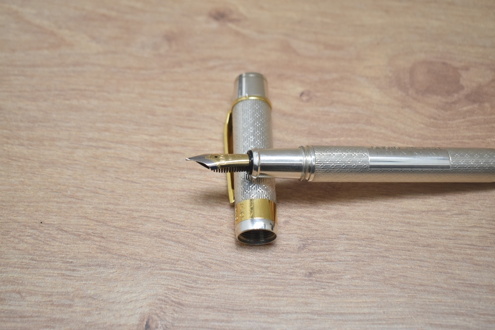 An Onoto University of Cambridge limited edition fountain pen 1/200 in solid sterling silver, with - Image 3 of 6