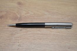 A Parker 51 propelling pencil in black with Lustraloy cap. engraved