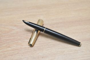 A Parker 61 Custom converter double jewel fountain pen, with rolled gold cap having Parker 14k