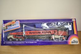 A 1980's Siku diecast, 4011 Tower Construction Crane in red, grey and black, boxed, models appear
