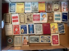 A box of vintage Advertising Playing Card Empty Boxes, some have incorrect card packs inside