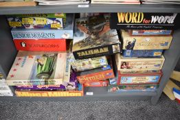 A shelf of mixed vintage games including Waddingtons Mine a Million, Hollywood, Formula One, Rio