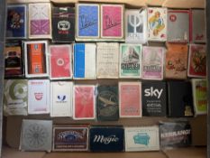 A box of vintage Advertising Playing Cards including Sky, Asterix, Kerrang, Brut Musk, Stratton