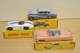 Three Dinky Die-casts, 131 Cadillac Eldorado, pink with cream hubs in original box with incorrect