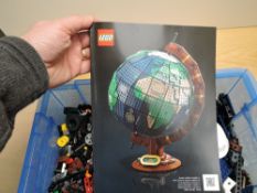 A modern Lego set, 21332 The Globe, appears complete, vendor checked for completeness, with