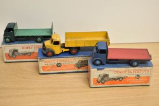 Three Dinky Die-casts, 513 Guy Flat Truck, blue cab & chassis, red bed, light blue hubs, 513 Guy