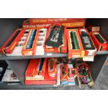 Two shelves of Hornby 00 gauge including R863 Diesel Electric Locomotive D1738, BR Locomotive 37130,