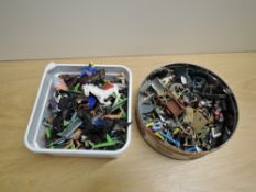 Two tin boxes of Britains and similar plastic Wild West, Military and similar figures, most on metal