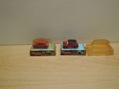 A Meccano Dinky die-cast, 183 Mini Minor (automatic) in red with black roof, on bubble card display
