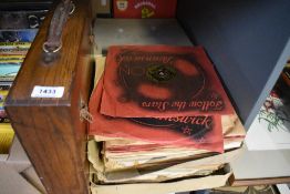A large collection of shellac records some in a wooden carry case including titles such as Bing