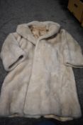 A vintage faux fur coat.