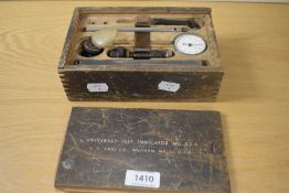 A vintage Universal Test Indicator, No.22A, by B.C Ames, Waltham USA, housed within a wooden box