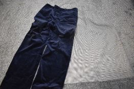 A varied lot of vintage and retro ladies and gents clothing, including gents navy blue velvet