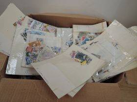 BOX WITH HUNDREDS OF BAGS OF OFF PAPER STAMPS, MINT AND USED Box of pure stamps in clear faced
