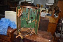 A vintage woodworkers/joiners tool cabinet and selection of antique and vintage tools
