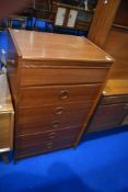 A vintage teak bedroom chest of one concealed, over five drawers, aprox. dimensions W78cm D47cm