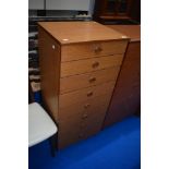 A vintage laminate bedroom chest of narrow proportions, labelled Schreiber , dimensions approx W51