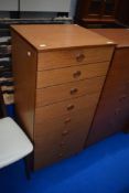 A vintage laminate bedroom chest of narrow proportions, labelled Schreiber , dimensions approx W51