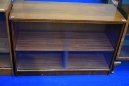 A vintage teak effect low bookcase, width approx 110cm (H72, D43)