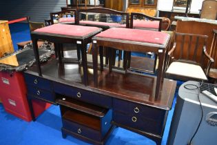 A Stag dressing table, bedside table and two stools, dressing table width approx 153cm