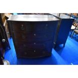 A 19th Century mahogany bow fronted chest of two over three drawers having Regency style handles