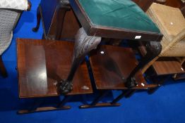 An early 20th Century dressing table stool having cabriole legs, with ball and claw feet