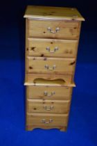 A pair of modern pine bedside chests of three drawers, each approx W44 D39 H57cm