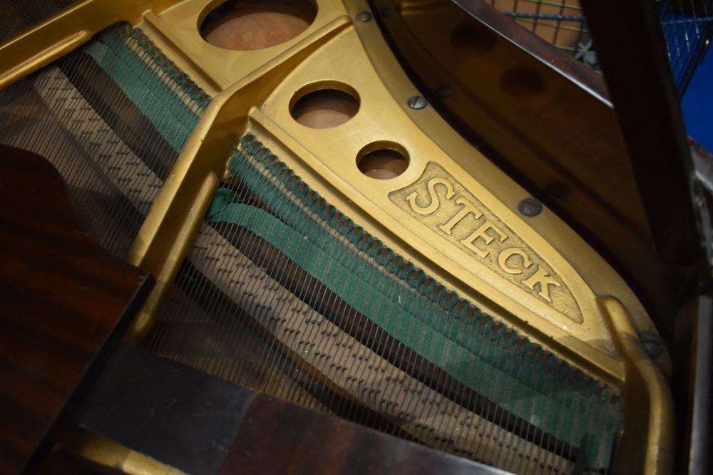 An early 20th Century mahogany cased baby grand piano by Steck having metal overstrung frame, - Image 3 of 5