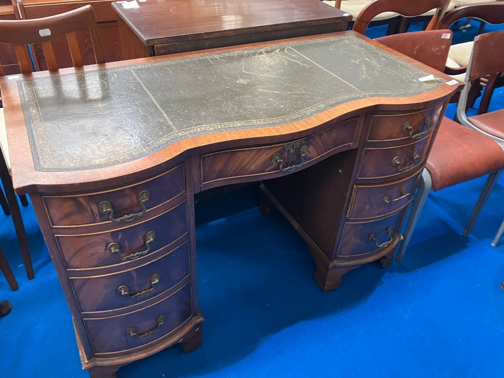 A reproduction Regency serpentine front desk, width approx 115cm