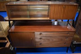 A vintage sapele sideboard of stylised form, width approx 141cm