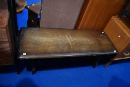 A vintage dark stained Ercol style coffee table, approx 120cm x 46cm