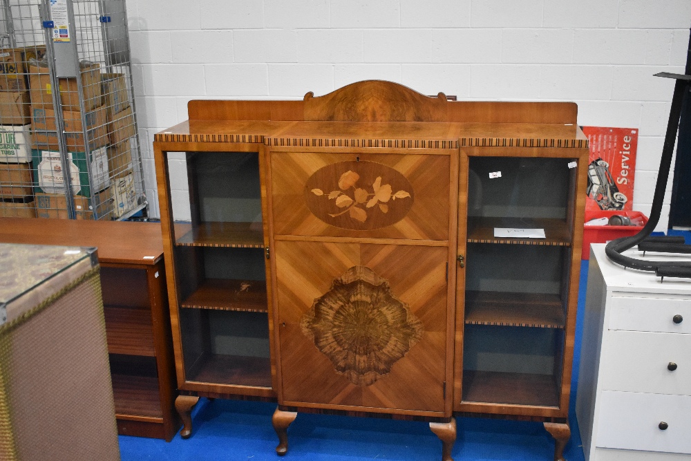 A vintage side by side display cabinet with marquetry decoration to front panel, width approx 140cm,