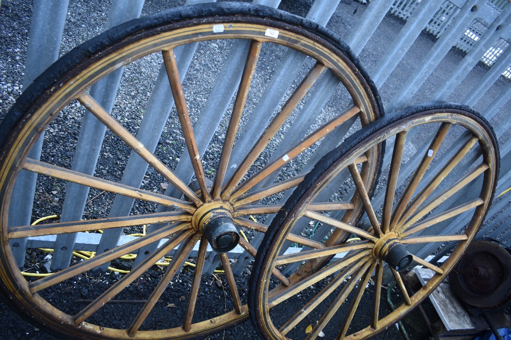 A pair of vintage trap or gig wheels, rubber wheels perishing, rim diameter approx 120cm