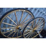 A pair of vintage trap or gig wheels, rubber wheels perishing, rim diameter approx 120cm