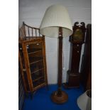 An early 20th Century mahogany standard lamp