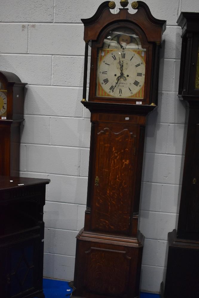 A 19th Century oak longcase clock having mahogany cross banding, with 8 day movement and painted