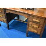 A vintage oak desk, approx dimensions W153 D77 H77