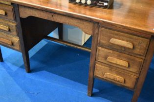 A vintage oak desk, approx dimensions W153 D77 H77