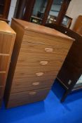 A vintage laminate bedroom chest of five drawers, labelled Schreiber, dimensions approx W61 D43