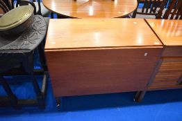 A vintage teak trolley table having drop leaf to one side, width approx 84cxm, open depth 92cm,