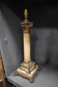 A late 19th Century marble and gilt metal table lamp base, Corinthian column, measuring 54cm tall