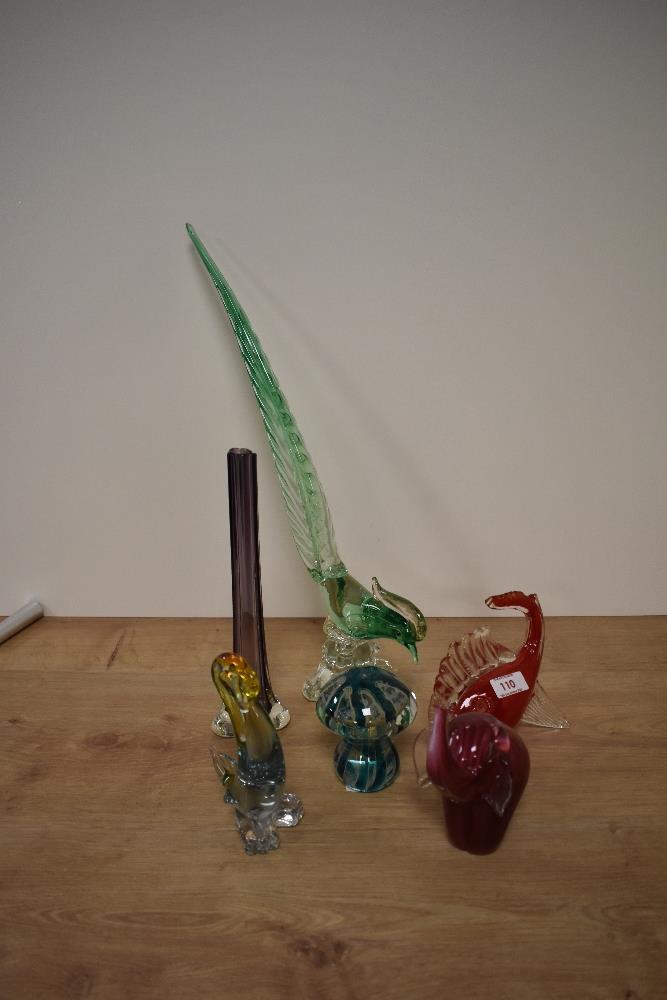 An assorted collection of art glass, including an amethyst coloured vase, a Mdina glass mushroom,