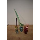 An assorted collection of art glass, including an amethyst coloured vase, a Mdina glass mushroom,