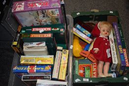 An assortment of vintage board games including Scrabble, Ludo, Master mind and a set of Draughts,