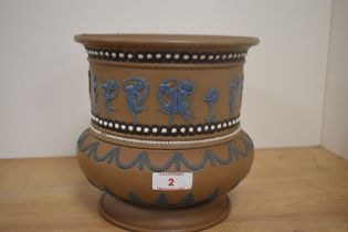 A late 19th/early 20th Century Doulton Lambeth silicon ware jardiniere, the stoneware body decorated