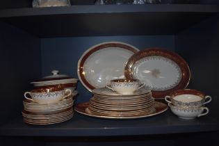 A quantity of John Maddock & Sons Ivory Ware ruby and gold coloured dinnerware