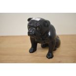 An early 20th Century ceramic figure of a British bull dog, marked 'England' to the underside,