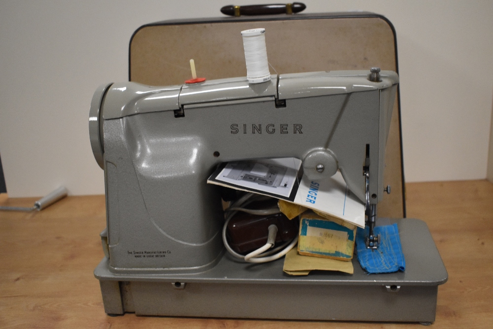 A vintage cased Singer sewing machine