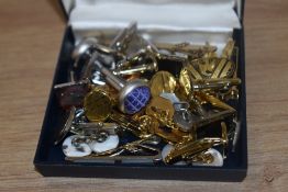 An assorted collection of yellow metal and vintage cuff links