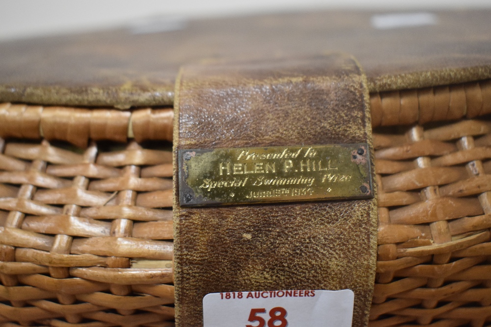 An early 20th Century wicker basket, with leather lid, and applied brass presentation plaque, - Image 2 of 2